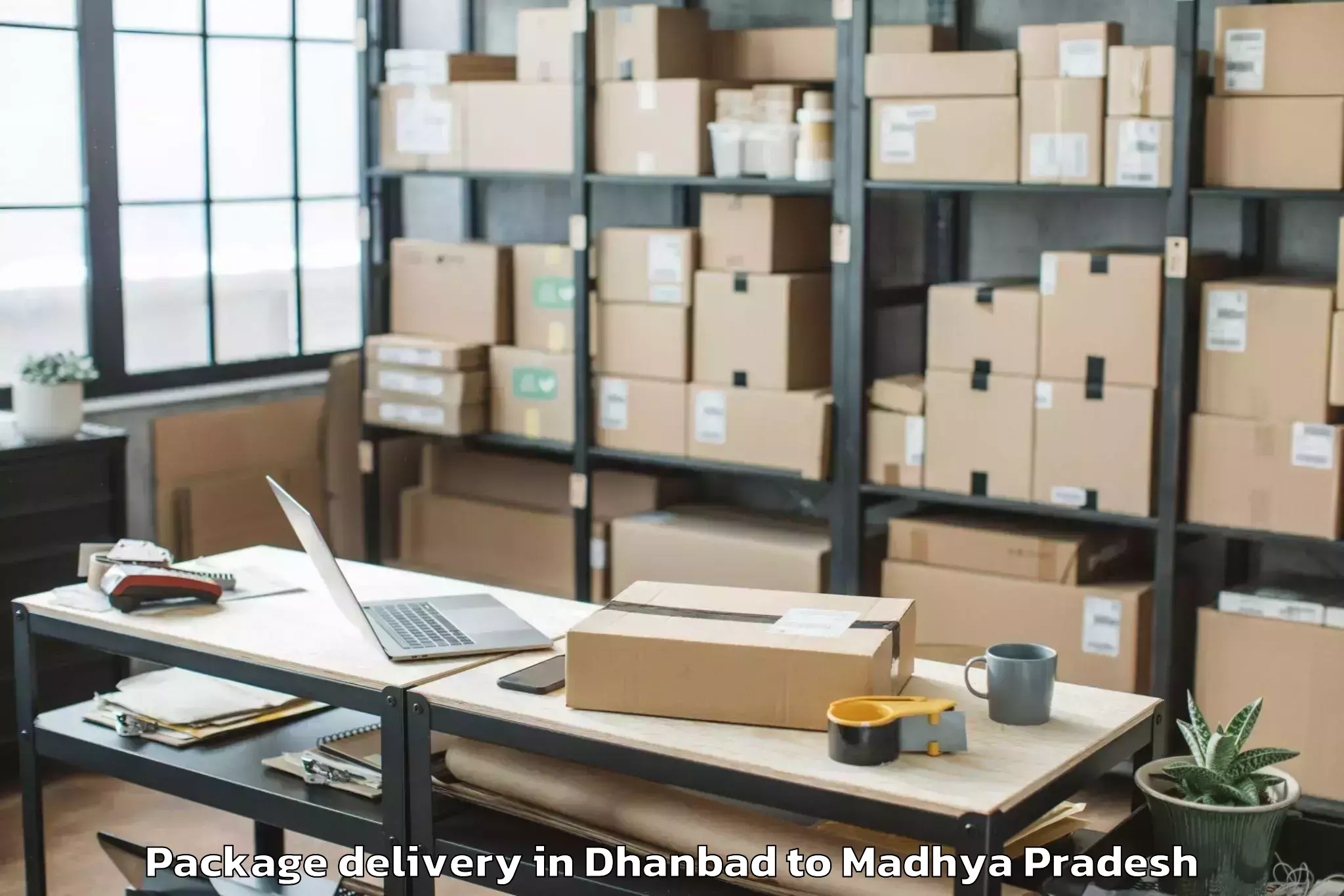 Top Dhanbad to Mandleshwar Package Delivery Available